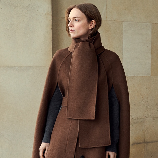 Woman wearing a brown coat