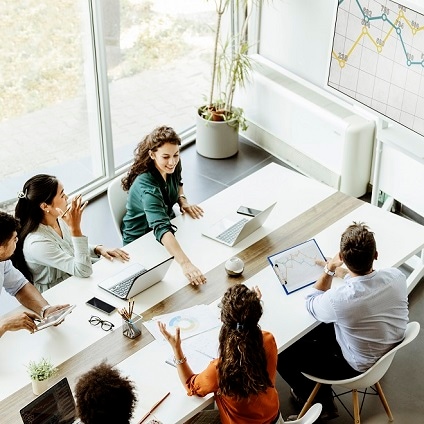 Colleagues discussing a project in the office