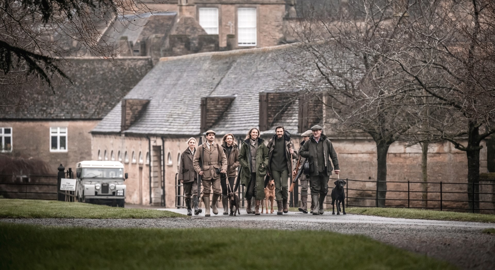 A group of people walking outside
