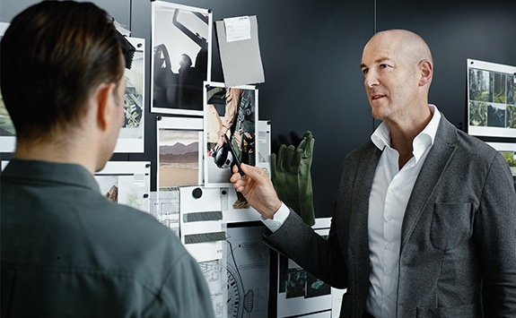 Colleagues discussing in a Richemont office