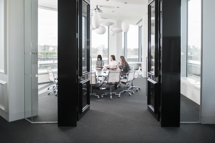 A group of workers having a meeting in a conference room