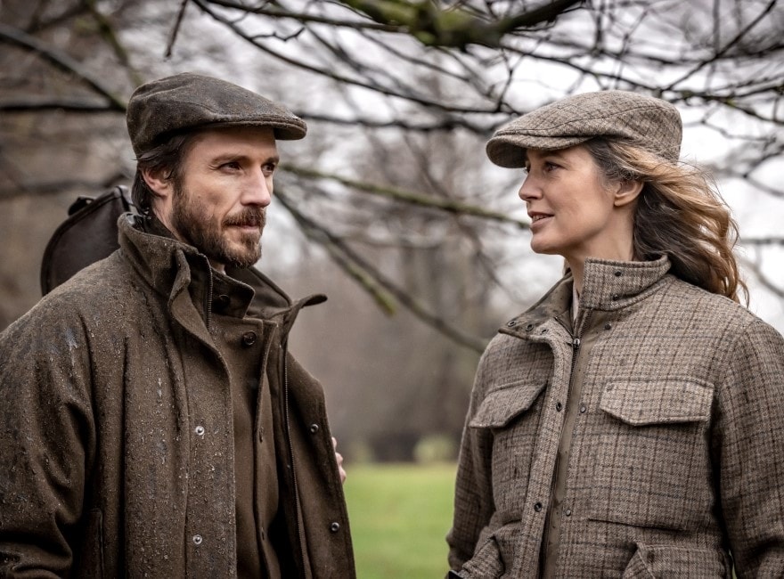Two people in brown jackets